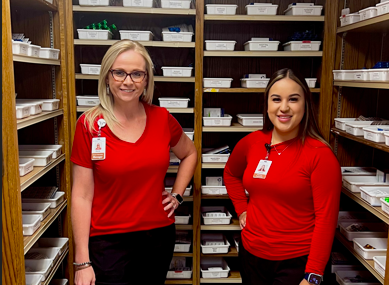 Pharmacy Manager Brandy Wolf and Pharmacy Tech Yaneth Anaya smiling.